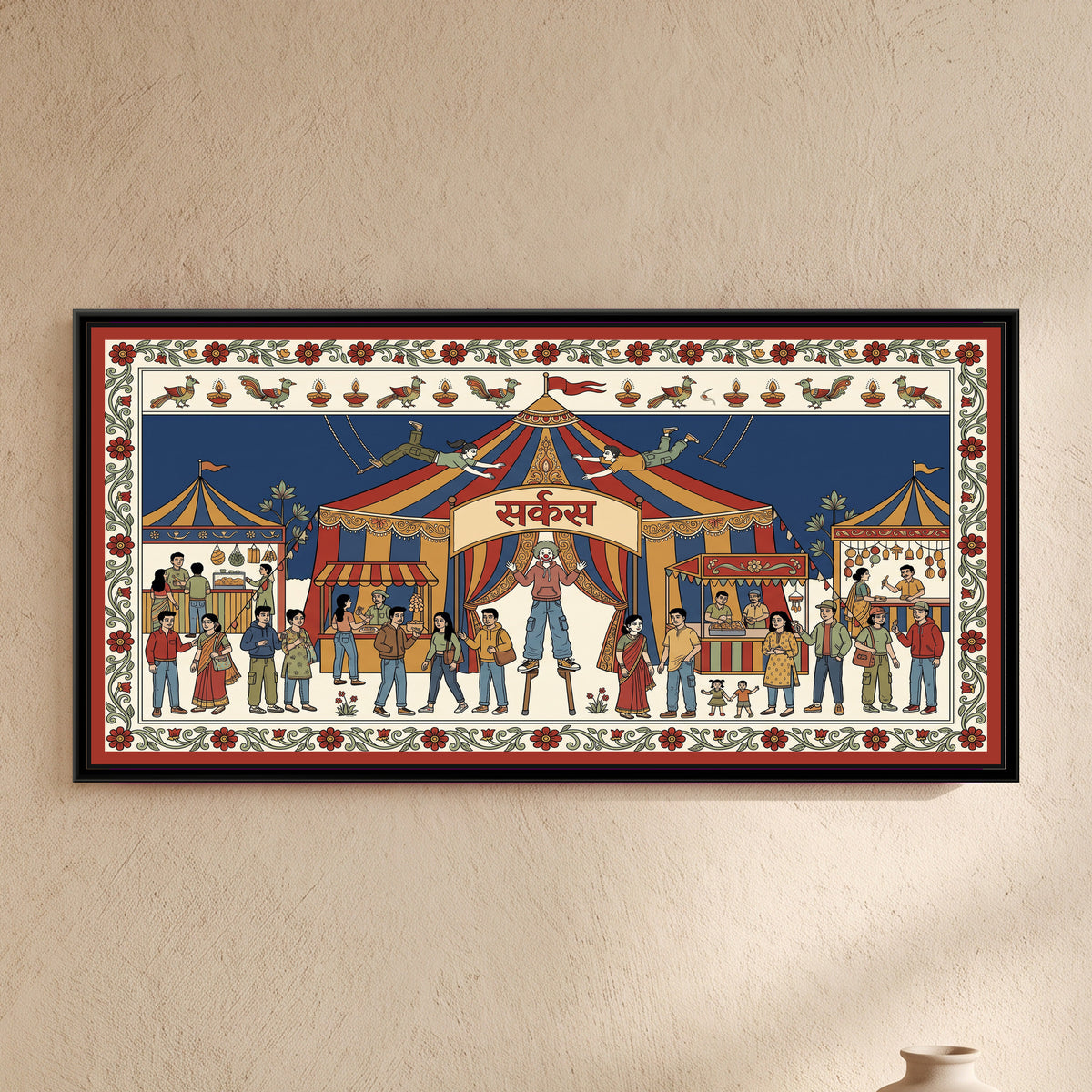 Kalamkari Painting – Mela Circus - framed canvas print of two trapeze flyers above a striped circus tent, a clown in a hoodie on stilts, a young crowd in jeans, hoodies and saris between food stalls, Kalamkari style panoramic, hung on a wall