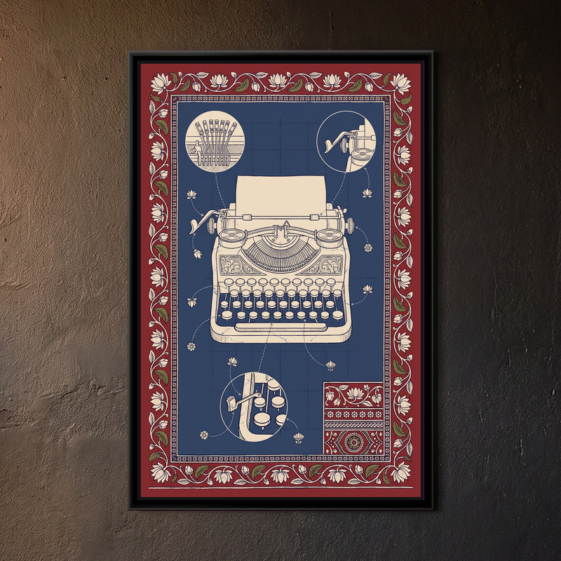 Kalamkari Blueprint – Typewriter - framed canvas print of a cream line drawing of a vintage typewriter with a sheet in the roller on an indigo blueprint grid, with detail circles of the typebars, the carriage lever and the keys, flower-tipped pointer lines, a small patterned swatch in one corner, deep red border of lotuses and leaves, hung on a wall