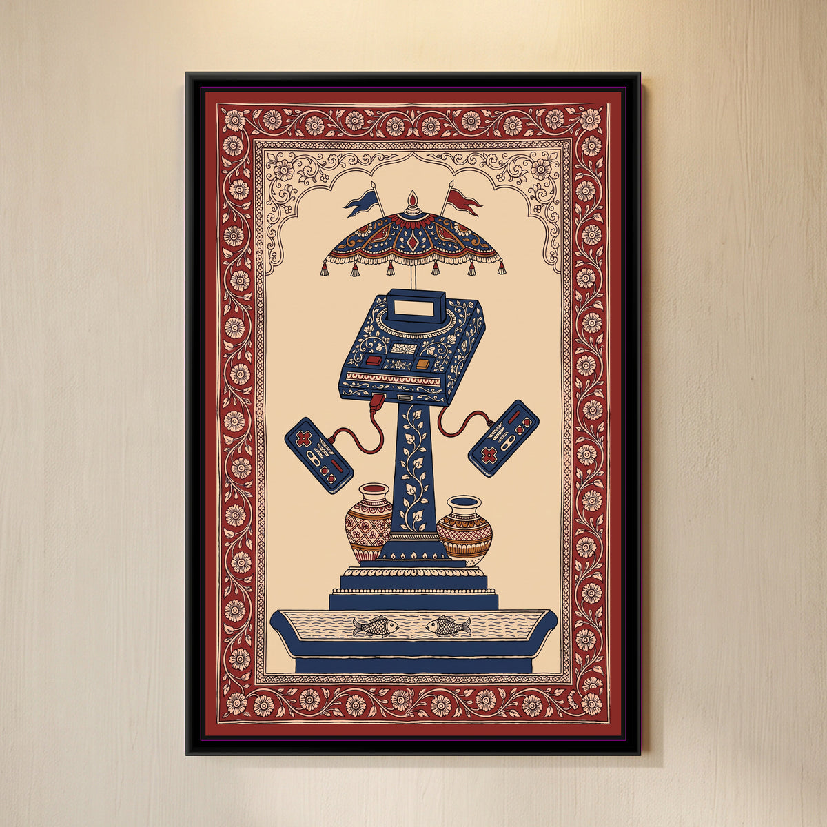 Kalamkari Painting – Retro Games Console - framed canvas print of a retro cartridge games console covered in cream flowers on indigo, standing on a tall indigo pillar painted with a climbing vine, two wired controllers swinging out on either side, a fringed parasol with two pennants above, two patterned pots at the foot of the pillar, a stepped base and a water trough with two fish, deep red floral border, hung on a wall