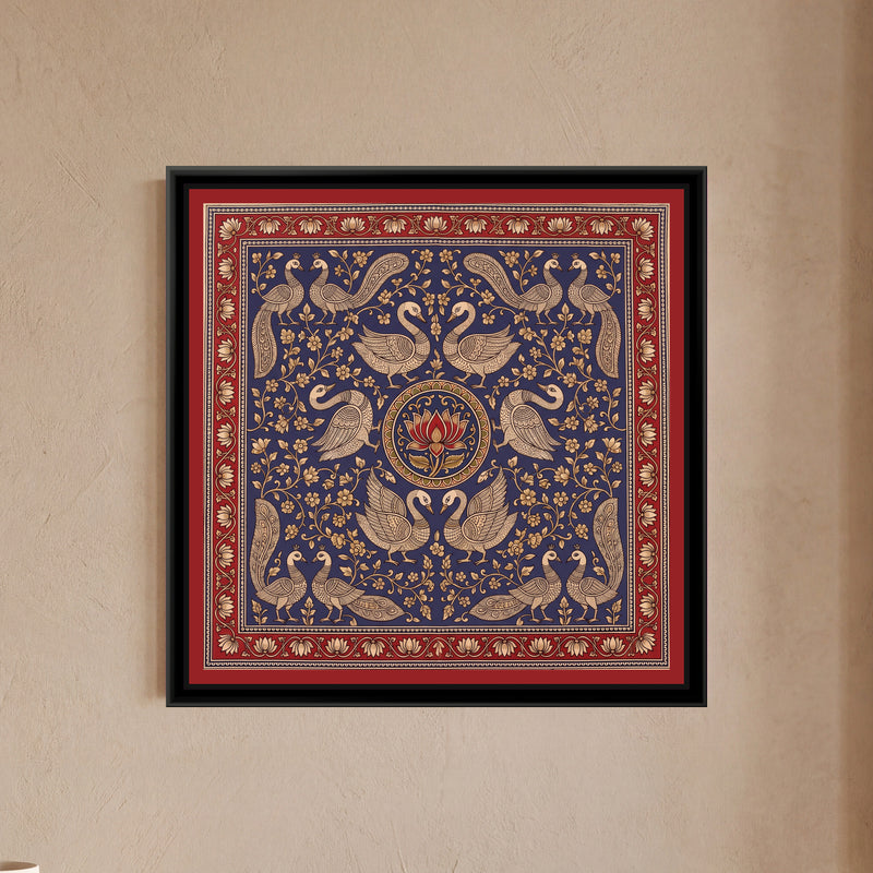 Kalamkari Painting – Swan Mandala – Indigo - framed canvas print of six cream line-drawn swans with finely patterned wings arranged in mirrored pairs around a round medallion holding a single red lotus, pairs of crested peacocks with long patterned tails in all four corners, cream flowering creepers filling a deep indigo blue ground, inside a madder red border of cream lotuses on a trailing vine, hung on a wall