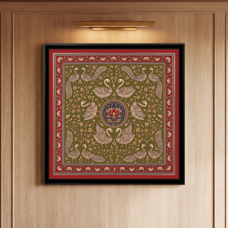 Kalamkari Painting – Swan Mandala – Olive - framed canvas print of six cream line-drawn swans with finely patterned wings arranged in mirrored pairs around a round indigo medallion holding a single red lotus, pairs of crested peacocks with long patterned tails in all four corners, cream and ochre flowering creepers filling an olive green ground, inside a madder red border of cream lotuses on a trailing vine, hung on a wall